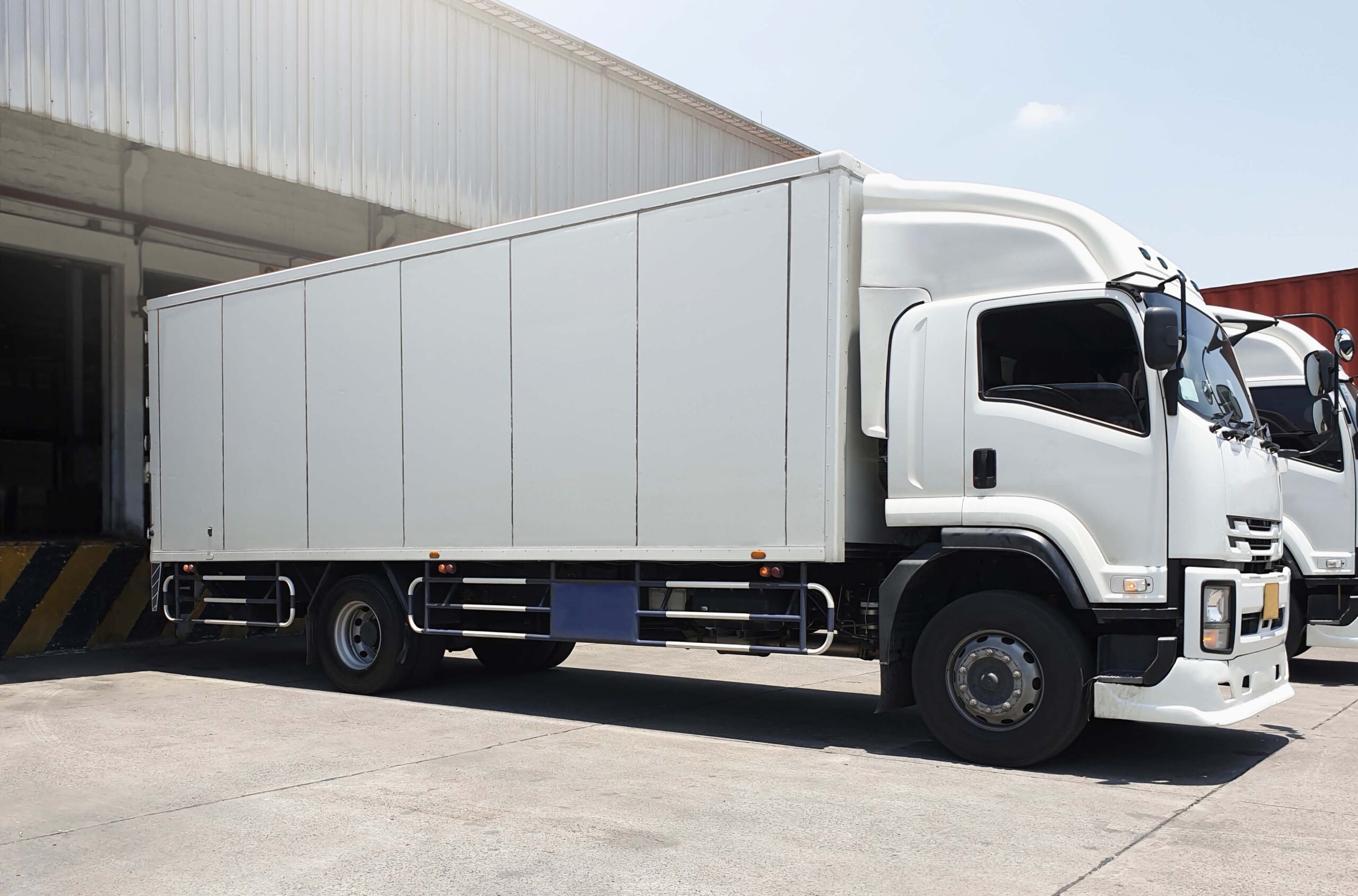 Cold storage truck being unloaded at the depot